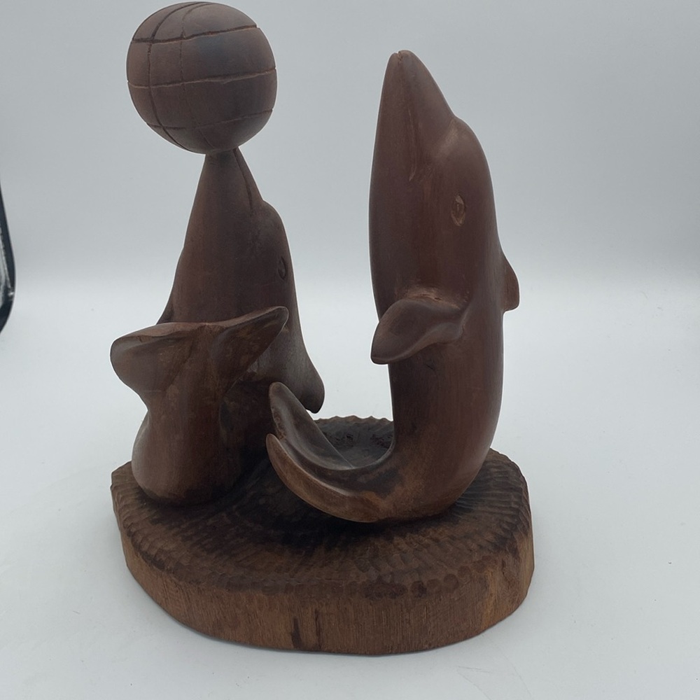 VTG Handcrafted carved wood dolphins playing with ball 10x8”